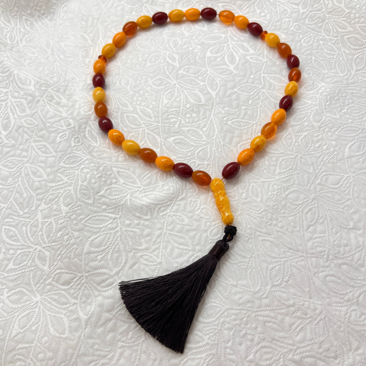Full view of Autumn Mosaic 33-bead Tasbih and black tassel