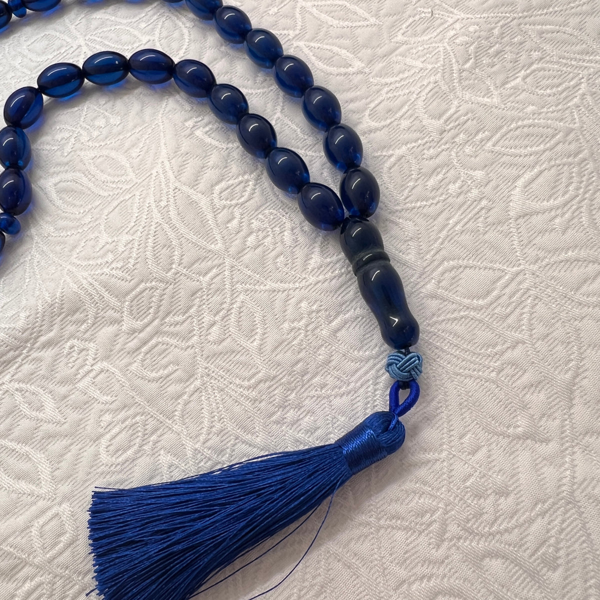 Close view of Midnight Blue Tasbih beads and blue tassel