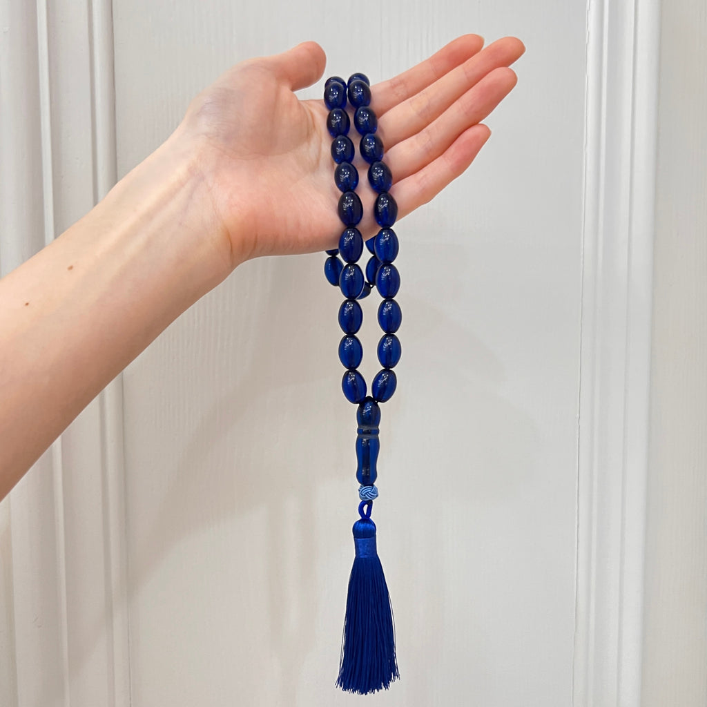 Midnight Blue 33-bead Tasbih shown in hand for scale